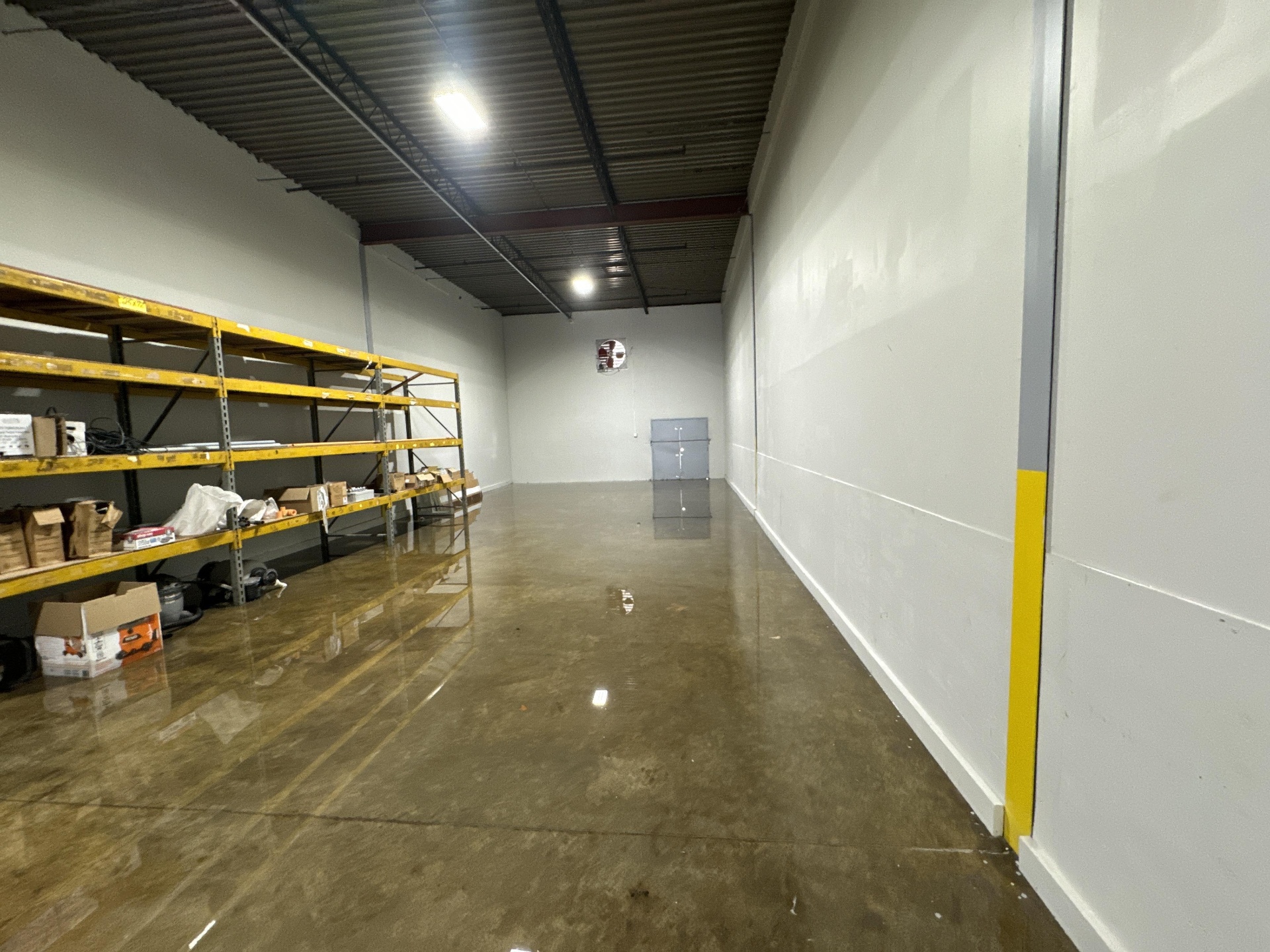 Warehouse shelves flooded after a storm event in Salt Lake City
